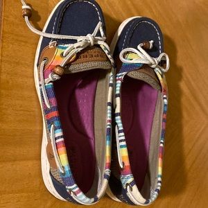 Rainbow Sperry slip-on boat shoes.